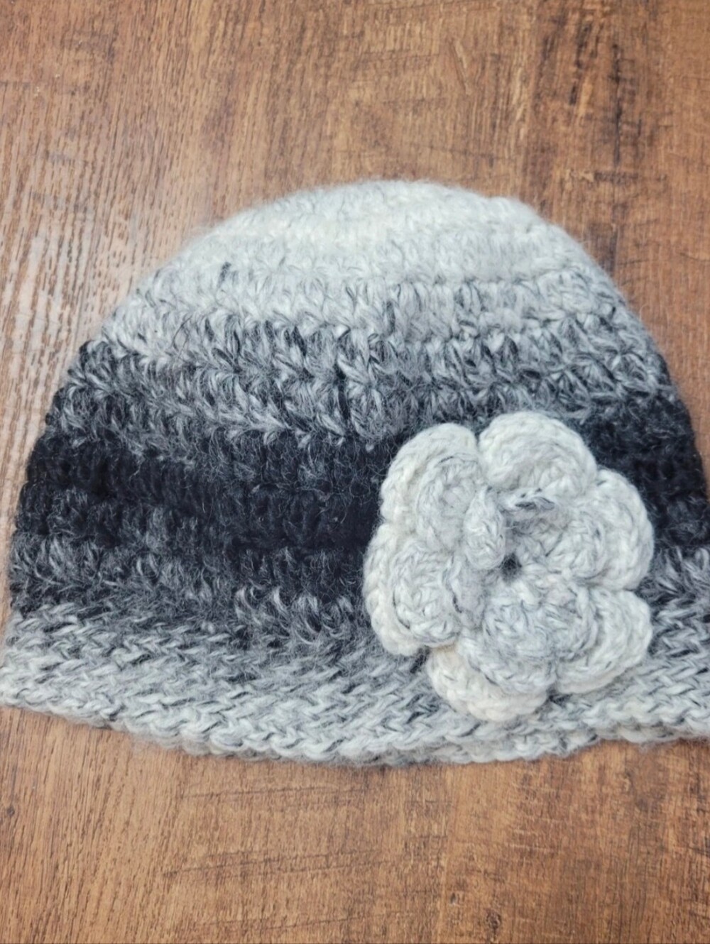 Handmade crochet bun beanie with flower